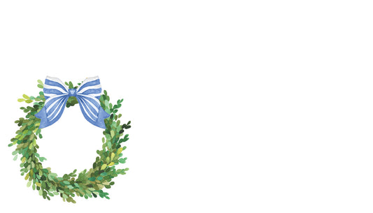 Green wreath with a blue bow on a white background